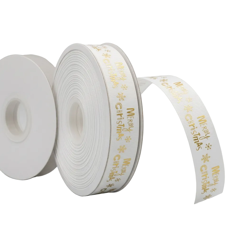 Three rolls of white grosgrain ribbon printed with gold 'Merry Christmas' text and snowflake patterns, displayed on a light gray background.