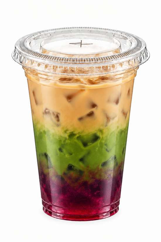 A clear plastic cup with a clear lid containing a layered iced drink with four distinct colors: a dark red/purple base, a green middle layer, a tan/beige top layer, and a light beige iced coffee layer on top. The cup is centered on a solid white background.