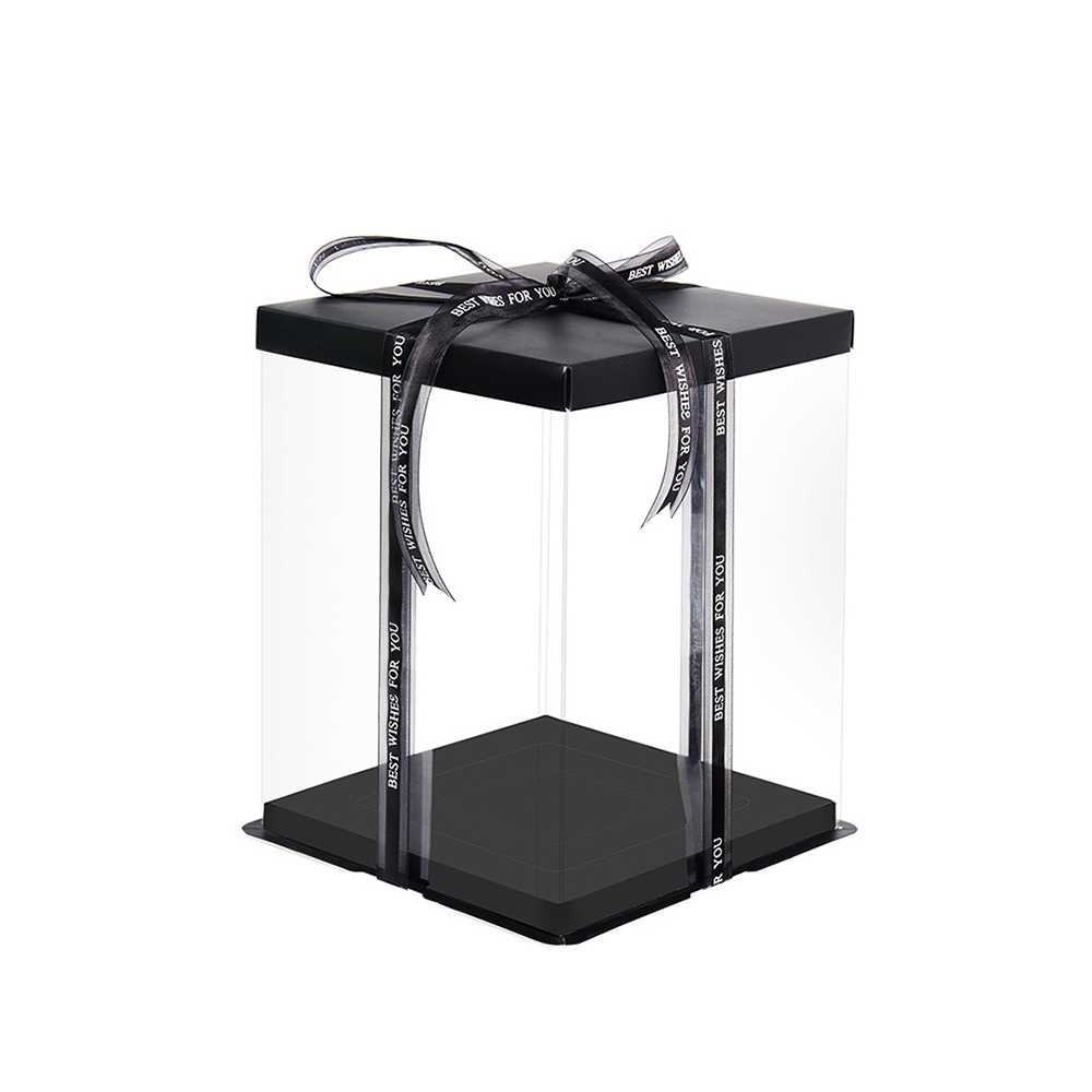 Black gift box with clear sides and a black ribbon on a white background