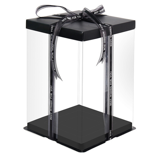Black gift box with clear lid and ribbon on a white background