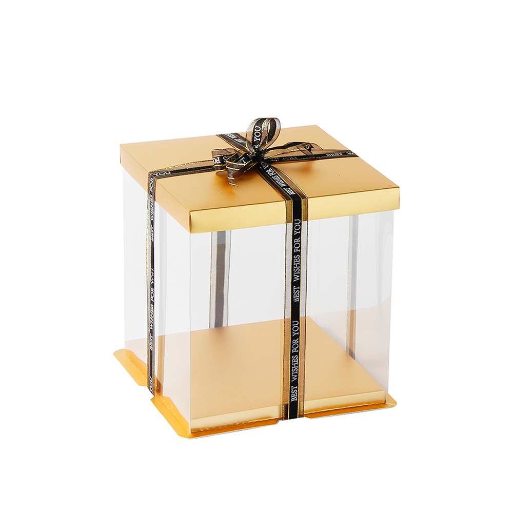 Clear gift box with gold lid and black ribbon on a white background