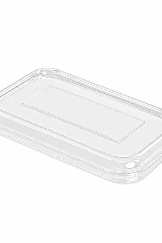 A clear plastic rectangular lid with rounded corners, shown at an angle on a light gray background.
